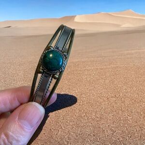 Vintage brass and silver tone bracelet. Stone tests as malakite.